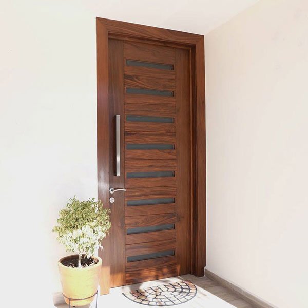 Proyectos puerta para entrada principal fanricada en madera solida de parota